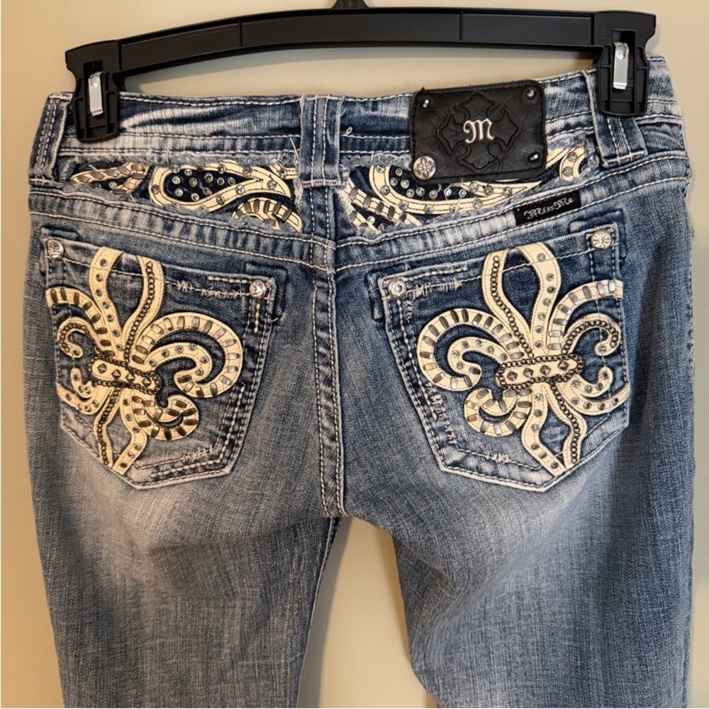 Miss Me Light Blue Denim Boot Cut Jeans with Cream Fleur-de-lis Embroidery